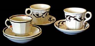 2 sets of Handled Cups and Saucers, Lustre worn on inside