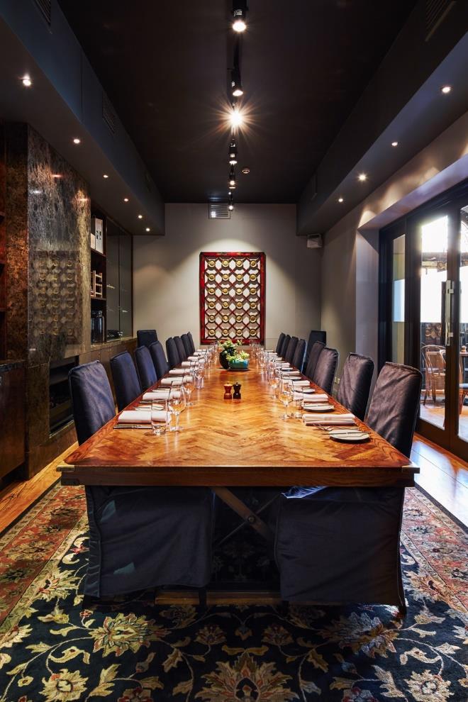 THE WINE ROOM Our opulent wine room with built in cellars for keeping our vino in top-notch condition is an outstanding room with a beautifully stained wooden table to complement the marbled walls -