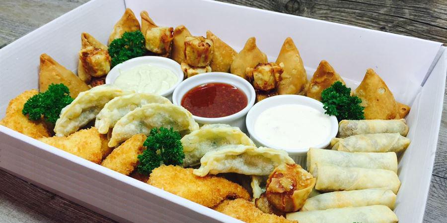 Platter - Your ultimate cocktail platter (50 pieces) Peking Duck spring rolls with sweet chilli dipping sauce, Samosa with yoghurt dipping sauce, Prawn