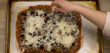 divided 1 (8 ounce) can no salt added tomato sauce ¼ cup sliced black olives 1 cup shredded cheddar cheese 2 cups