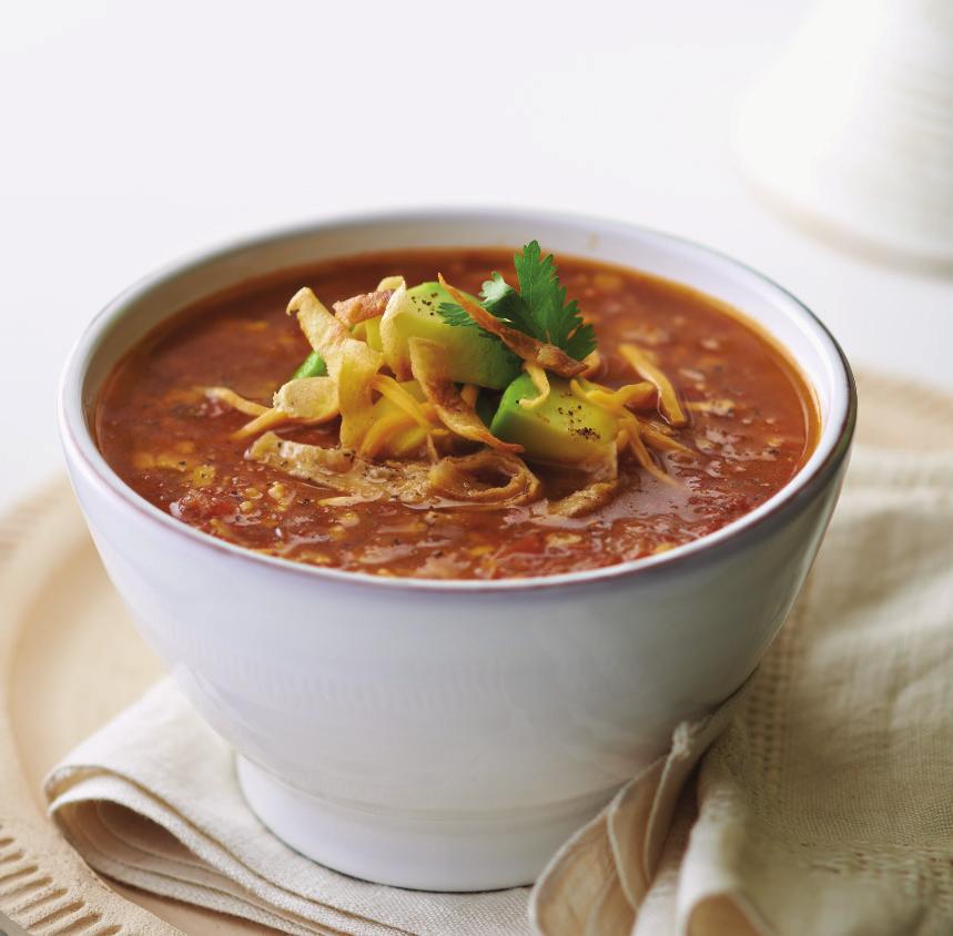 Serves 4 Serving size: 1 cup PREP: 5 COOK: 15 Mexican Tortilla SOUP ½ small yellow onion, peeled 1 garlic clove, peeled ½ tbsp. extra virgin olive oil 1 tbsp.