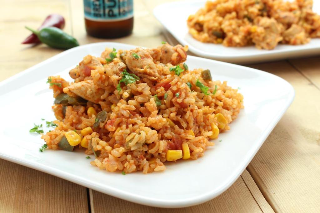 CAJUN CHICKEN JAMBALAYA INGREDIENTS 1 green pepper, diced 1 red pepper, diced 1 onion, diced 2 garlic cloves, crushed 400g can of chopped tomatoes 700ml stock 4 tsp Cajun spice 1 tsp chilli flakes