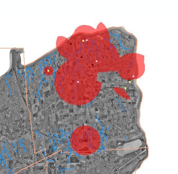The image in Figure 8 shows multiple red polygons that represent areas where the hydrology buffer and the winery buffers overlapped.