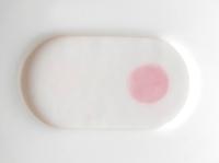 A pink/red control spot of medium intensity should always appear on the right hand side of the read-out area as an indication that the food extract is suitable, the test has been performed correctly