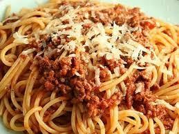 Spaghetti bolognese I onion 1 clove garlic 1 carrot 1 celery stick 1 x 15ml oil 250g minced beef 400g canned chopped tomatoes 1 x 15ml spoon tomato puree 100ml water 1 x 5ml spoon mixed herbs Black