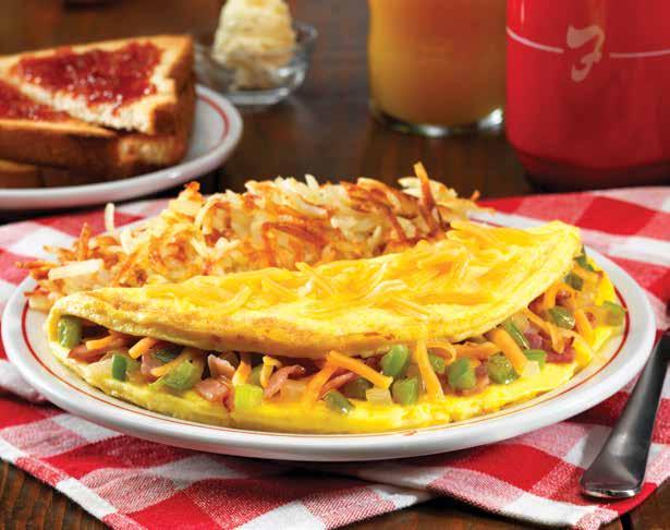 WESTERN OMELETTE HOG HEAVEN BURRITO Omelettes are served with hash browns, toast and jelly.