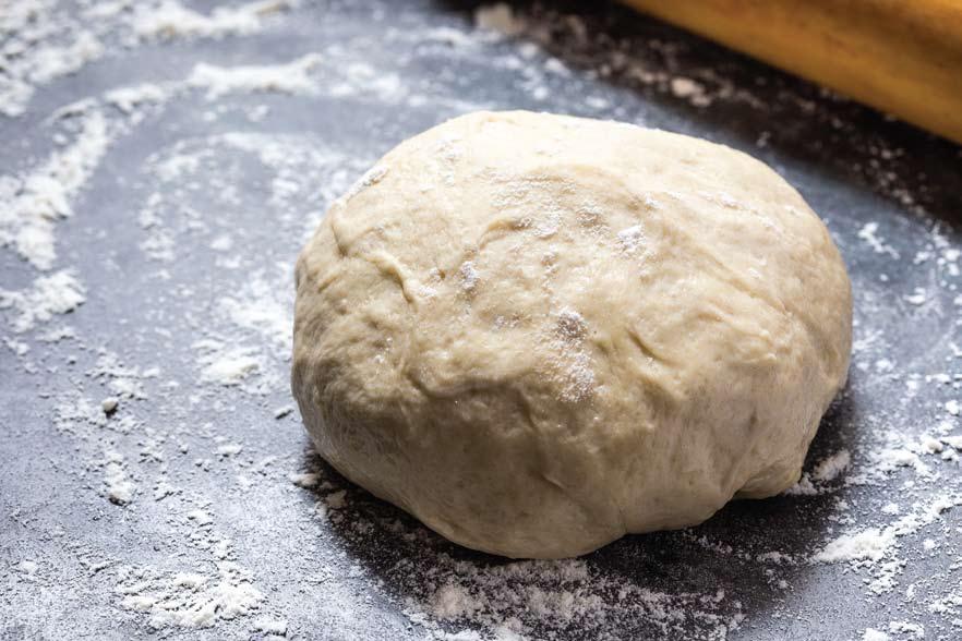 YIELD 1 12 PIZZA PREP TIME 15 MINUTES + 2 HOURS OR OVERNIGHT COOKING TIME 10 MINUTES 1 TEASPOON ACTIVE DRY YEAST 1/4 CUP WARM WATER 1 1/2 CUPS (180 GRAMS) ALL-PURPOSE FLOUR 1 TEASPOON KOSHER SALT 1/2