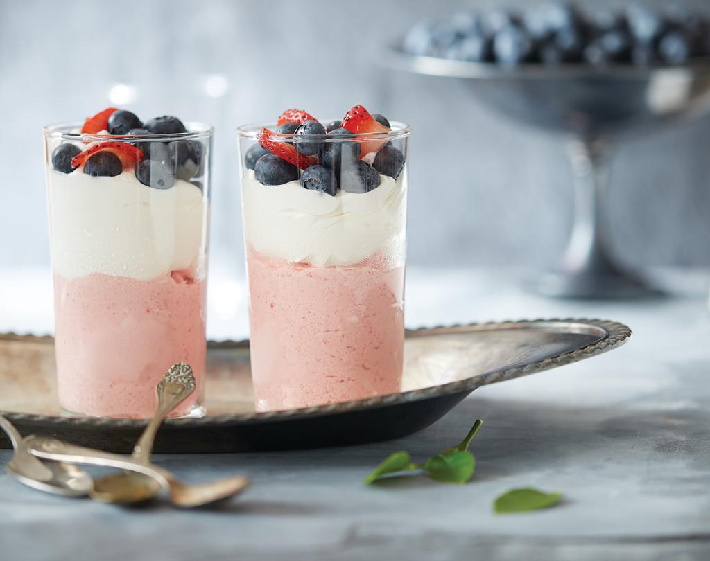 Cream cheese and thickened cream blend with frozen strawberries to create this decadent dessert.