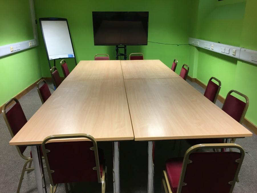 The room comes equipped with a flat screen TV to display presentations, flipchart, and a laptop (if needed), all included in the room hire charges.