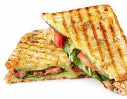 PANINI SANDWICHES Served with French Fries BALSAMIC PANINI Grilled Chicken, Eggplant and Roasted Peppers with Fresh Mozzarella STEAK PANINI Sliced Steak, Peppers, Onions, Mushrooms and Mozzarella