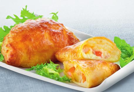 PORTUGUESE PRAWN PUFFS 1 packet puff pastry, rolled out 1 onion, chopped 1 oil 2 tbsp flour 250 ml milk 3 egg yolks 200 ml chicken stock 200 g shrimps or small prawns, cooked and peeled Lemon juice