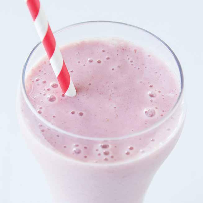 STRAWBERRY BANANA SMOOTHIE PREP: 5 MINUTES CONTAINER: PITCHER MAKES: 4 SERVINGS 4 small ripe bananas, cut in half 2 cups low-fat milk 1 /4 cup