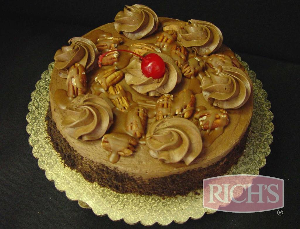 Pecan Turtle Cake Iced With Rich's Chocolate Bettercreme or Double Rich Chocolate Bettercreme 8CS large star Tip #3 piping Whole Pecans, Maraschino cherry Allen Uniced Chocolate Round Cake Base Iced