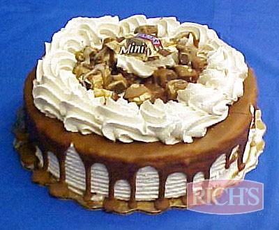 Snickers Round Cake Iced With Rich's Bettercreme 8CS large star #4 Piping Bit Size and large Snicker candy bars JWA Round ChocolateCake Layer Rich's Bettercreme Classic Caramel Icing Snickers Candy