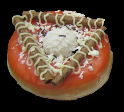 Dip the yeast-raised ring in colored fondant or sugar glaze, drizzle Choco in rays as indicated in the picture.