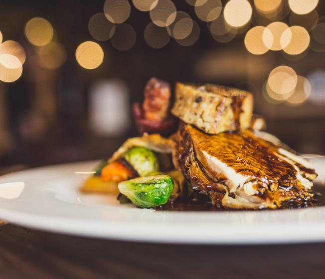 Croxton Manor cheddar and chestnut parcel Festive turkey, apple and sage stuffing and pigs in blankets Gammon chop with a port and clementine sauce Grilled haddock with chardonnay and chervil cream