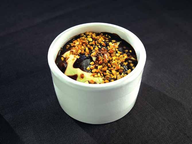 and caramelised hazelnut and almond pieces. Presented in a ceramic pot.