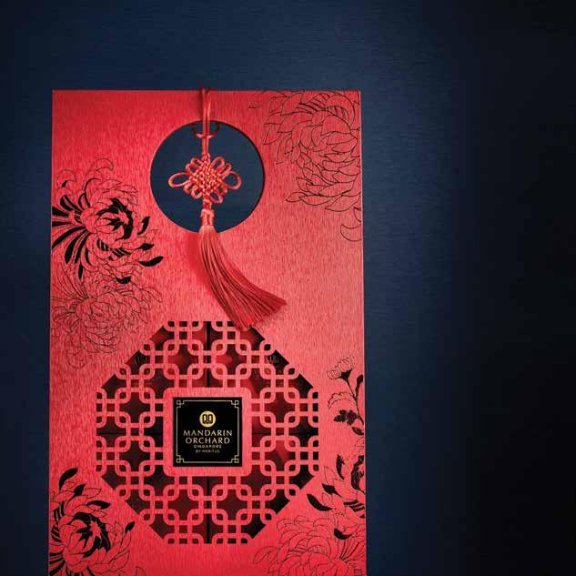 Individually encased baked mooncakes are elegantly presented in a customdesigned carrier that features Mandarin Orchard Singapore s iconic lattice pattern, accentuated by a motif of