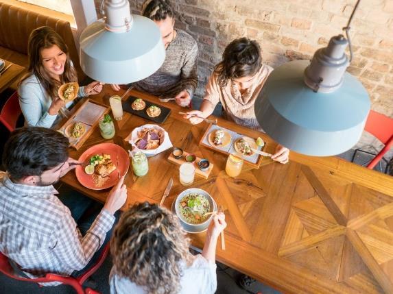 Appealing to families Hispanics are more likely than the general population to say they consider restaurants a great place to get together with family and friends.