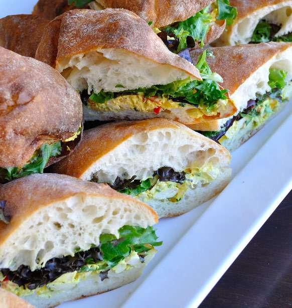 SANDWICHES AND WRAPS Chef s Selection of Artisan Sandwiches or Mini Buns $18 Includes: Organic Field Greens Seasonal Garnish House Vinaigrette Chef Inspired Seasonal Salad Assorted Cookies and