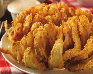 Blooming Onion 1 large sweet onion 2 eggs ½ cup milk cups all purpose flour 1 tsp cayenne pepper 2 tbsp paprika ¼ tsp salt ¼ tsp pepper 17 Slice 1-inch off top of onion so that the onion will stand.