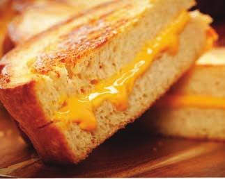 Spicy Grilled Cheese 34 2 slices thick cut bread (Texas toast bread) 2 slices pepper jack cheese 1 slice American cheese crushed red pepper butter Butter
