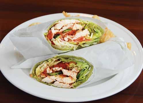 95 A Spinach Tortilla filled with Lite Tuna Fish and topped with Tomatoes, Cucumbers and Mixed Field Greens Vegetarian Wrap... $9.