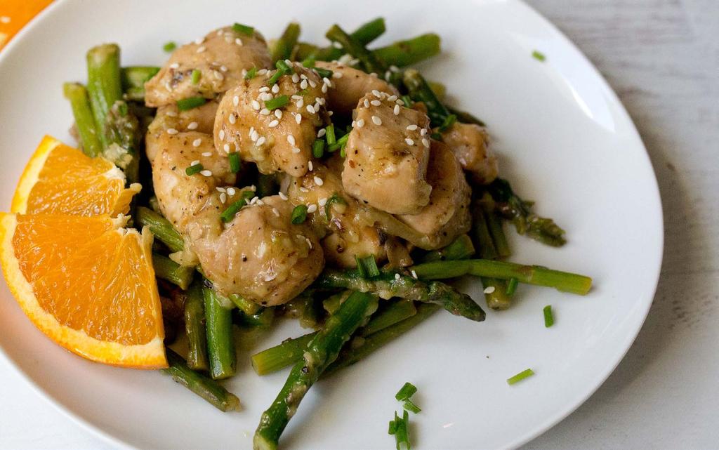 ORANGE CHICKEN STIR-FRY WITH ASPARAGUS 1 1/2 boneless, skinless chicken breast, diced 1 tbsp vegetable oil 2 lb asparagus 1 small yellow onion, sliced into pieces 8 oz button mushrooms, sliced 1 tbsp