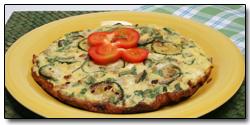 Zucchini and Onion Frittata Cooking spray, preferably olive oil 1/2 cup finely chopped onion 1 tsp. finely chopped garlic 8 oz.