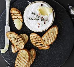 Lesson 3 FRANCE BAKED CAMEMBERT WITH HOMEMADE BREADSTICKS 250g Camembert, or Brie or other similar cheese 1 tbsp dry white wine 2 sprigs of fresh rosemary 3 garlic cloves 150g bread mix A container