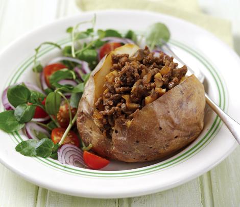 Baked potatoes with mince Kids tend to love baked potatoes, so make this filling, low-cost meal and serve it often!