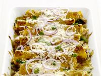 Green Grilled Chicken Enchiladas 1 small red onion, halved 1 can tomatillo sauce 1 package corn tortillas 3 or 4 chicken breasts 11/2 cup shredded skim mozzarella or jack cheese 1/3 cup fresh