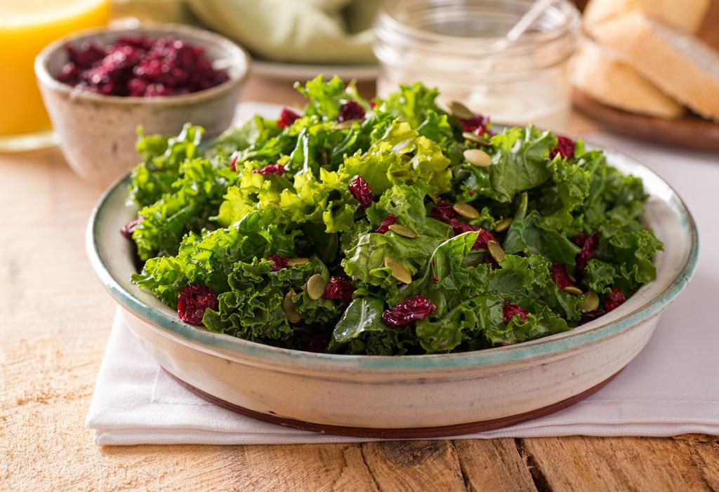 Kale Salad with Warm Raspberry Vinaigrette Ingredients: 3 Tbs Olive Oil, Divided 1 Shallot Peeled, Thinly Sliced 3 Cloves Garlic, Coarsely Chopped 1 Cup Dried Cranberries 2 Tbs Red Wine Vinegar 2 tsp