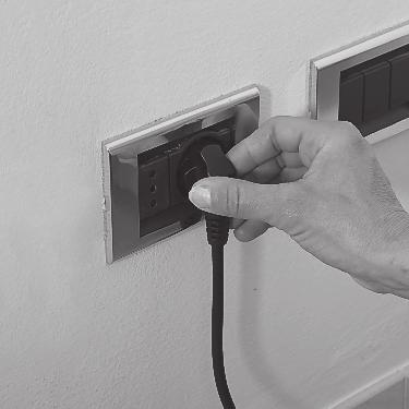 12 ENGLISH 11 Insert the plug at the other end of the power cord into a wall socket