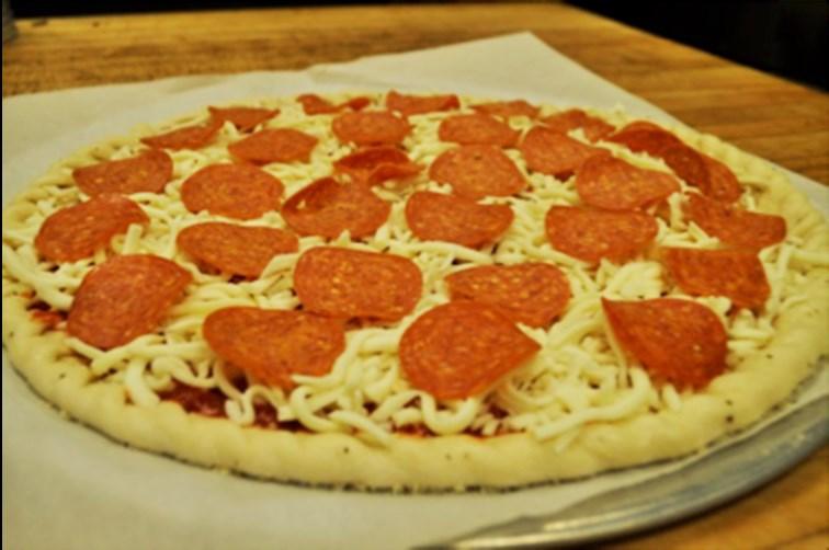 Make sure there is a 1/2 inch crust around the edge of every pizza 3. Cook pizza for 12-15 minutes 4. Each oven can fit up to 4 pizzas 5.