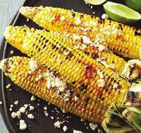 Recipe C orner Cuban Grilled Corn MAKES 4 SERVINGS INGREDIENTS 4 ears corn, husks peeled back and silk discarded 2 tablespoons melted butter /4 cup grated cotija or asiago cheese teaspoon paprika