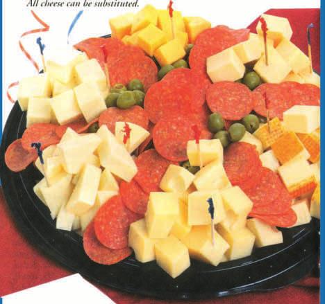 Domestic Cheese Platter A Perfect Beginning To A Festive Occasion A tray filled with Cheddar, Swiss, Muenster, Gouda and
