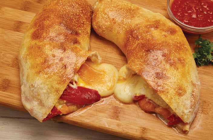 stromboli 1. Roll the pizza dough out until ¼ in. thick. 2. Layer the ham, cheddar cheese, mozzarella cheese, and bell peppers on one side of the dough. Fold the dough to seal. 3.