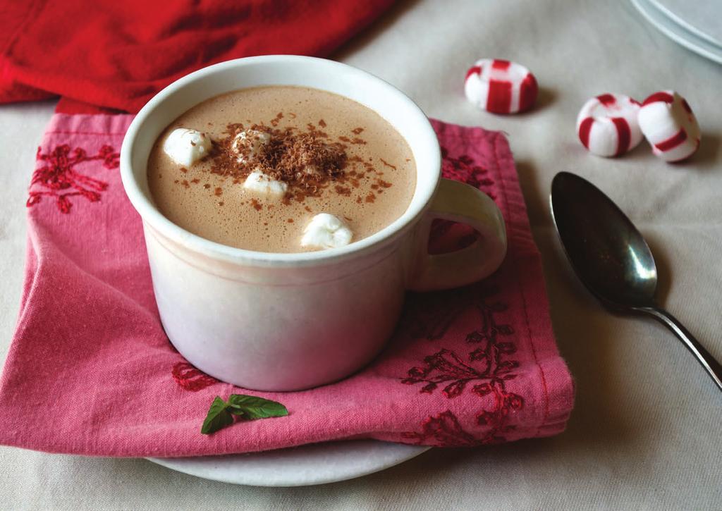 Peppermint Hot Chocolate INGREDIENTS 2 C whole milk 2 C heavy whipping cream 3 sprigs fresh peppermint 1 C semi-sweet chocolate chips ½ C milk chocolate chips 1/8 tsp pure vanilla extract Pinch of