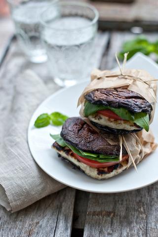 PORTABELLA & HAM BURGERS Another genius substitute for bread. Use grilled Portabella Mushrooms to hold your burger in place! Mushrooms assist in digestion, rather than upset it like some grains do.