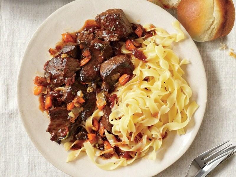 Ingredients 1 2# Chuck Roast cut into 2 cubes 4 garlic cloves crushed 2 tsp olive oil 1 cup red wine 2 c chopped carrots 1.5 c chopped onions.