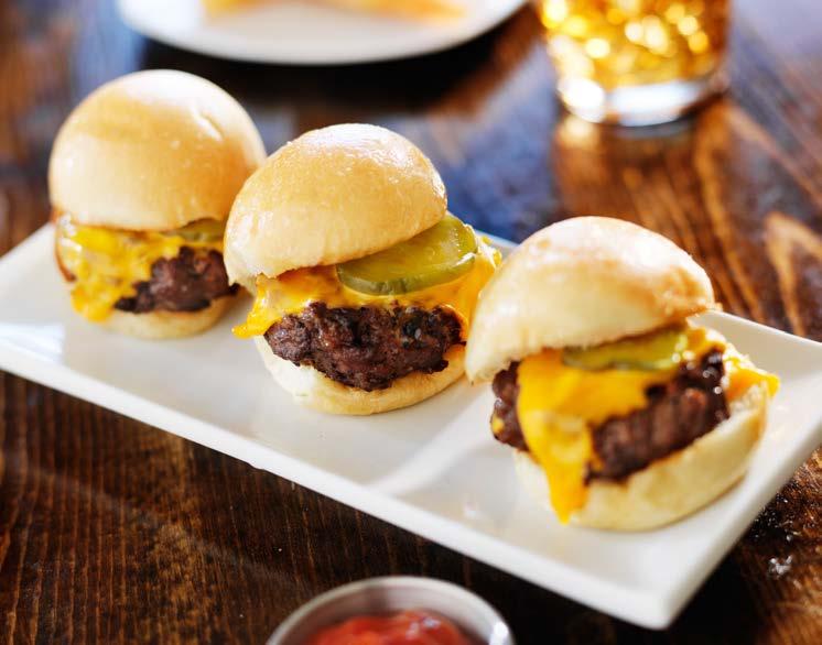 MINI CHEESEBURGER SLIDERS 8 oz. ground beef Salt Black pepper 2 slices cheddar cheese 2 dinner rolls 1. Preheat the Air Fryer to 400 F. 2. Form the ground beef into 2, 4-ounce patties and season with salt and pepper.