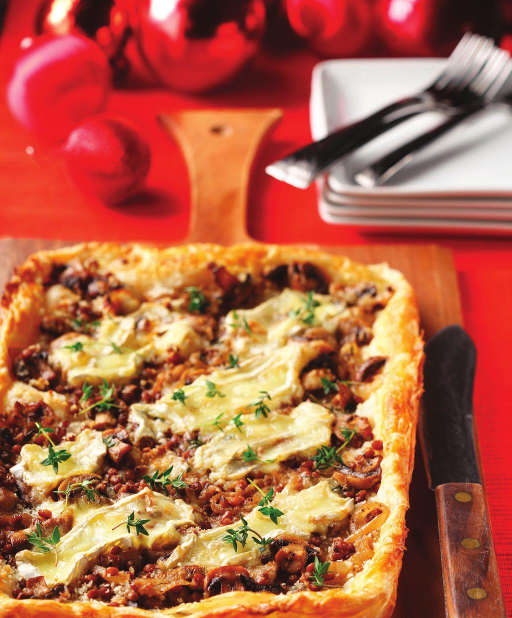 LENTIL & MUSHROOM TART WITH BRIE 1 pkg (400 g) puff pastry (defrosted) 1 egg, whisked 2 Tbsp (30 ml) bread crumbs 1 Tbsp (15 ml) unsalted butter 1 whole small onion, thinly sliced 11/2 cups (375 ml)