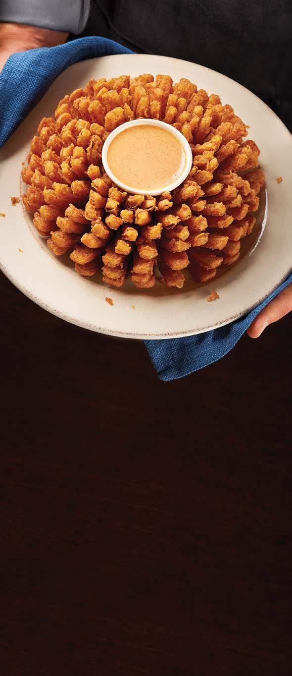 Bloomin Onion Aussie Tizers Bloomin Onion A true Outback original. Our special onion is hand-carved, cooked until golden and ready to dip into our spicy signature bloom sauce.