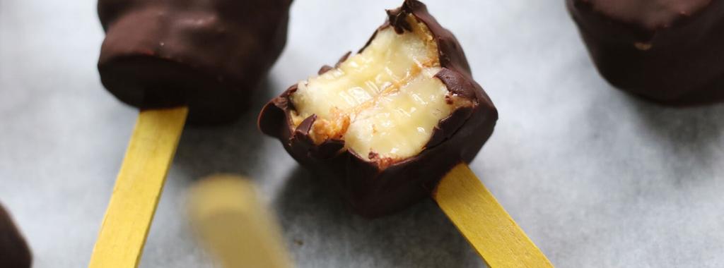 NSK Chocolate Peanut Butter Banana Pops 5 ingredients 1 hour 30 minutes 10 servings 1. Line a baking sheet with parchment paper. 2. Slice bananas into 1/2 inch thick rounds.