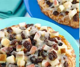 Place pizza crusts on small tray for toaster oven. Spread with spreadable fruit. Sprinkle with apples, raisins and cheese. Bake at 375 F for 10 minutes or until thoroughly heated and cheese is melted.