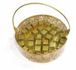 00 Gold 32 A brass metal round shaped box with 32 premium center-filled chocolates 750.