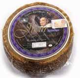 The cheese is encased within a yellowish-golden and slightly oily rind on which the brand name