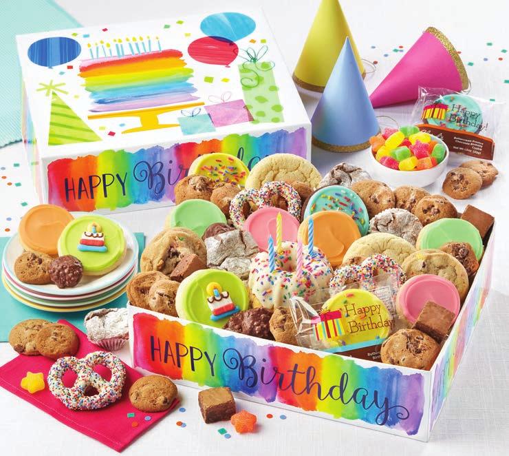 E. CHEERS TO YOU! A - B. MUSICAL BIRTHDAY GIFT TIN A birthday design complete with music! Every time you lift the lid our birthday tin plays Happy Birthday to You!