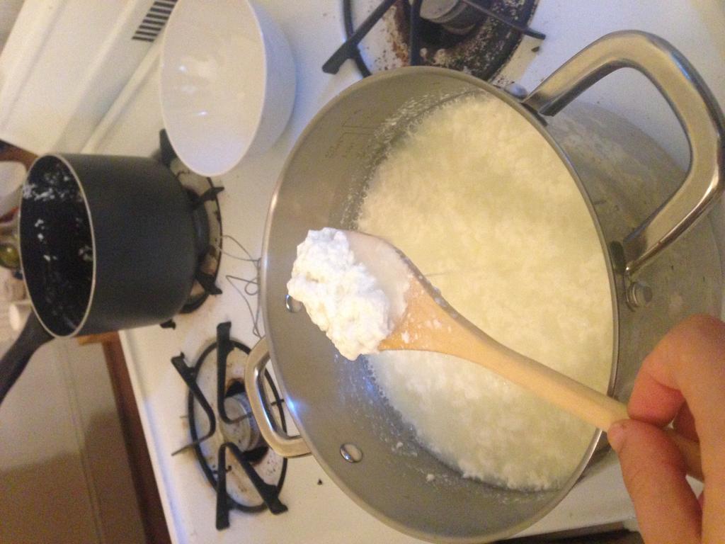 The casein structure that forms the curds traps more water as the micelles come together quickly, which ultimately affects the final texture of the cheese and would account for the squishy feel of